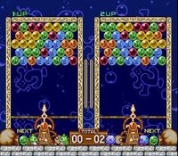une photo d'Ã©cran de Puzzle Bobble - Bust a Move sur Nintendo Super Nes